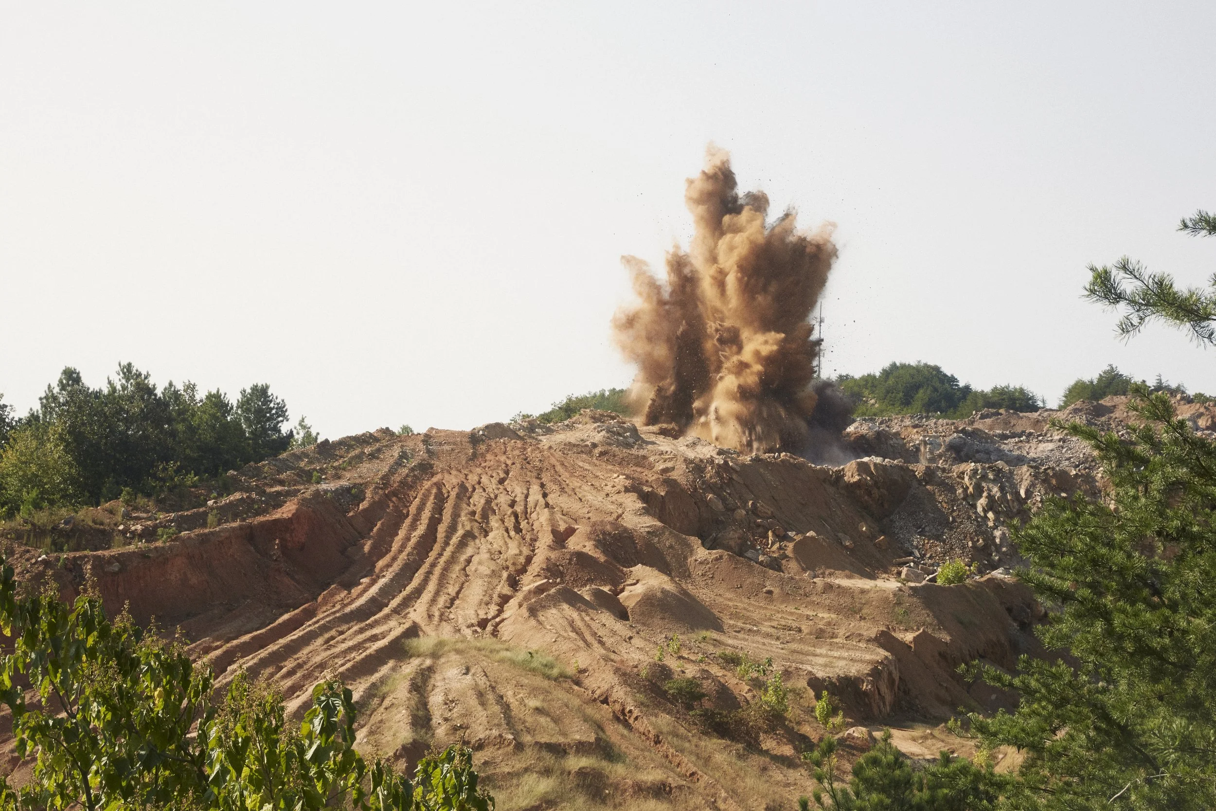 Blasting occurs 1-2 times a month.